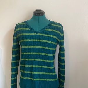 V-neck green cable knit sweater